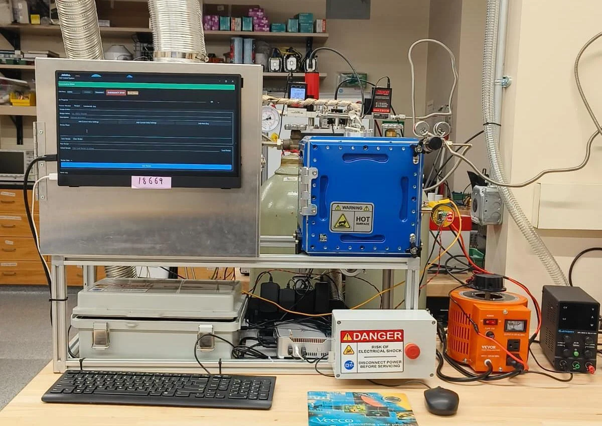 Custom HackerFab atomic layer deposition tool and process-control interface.